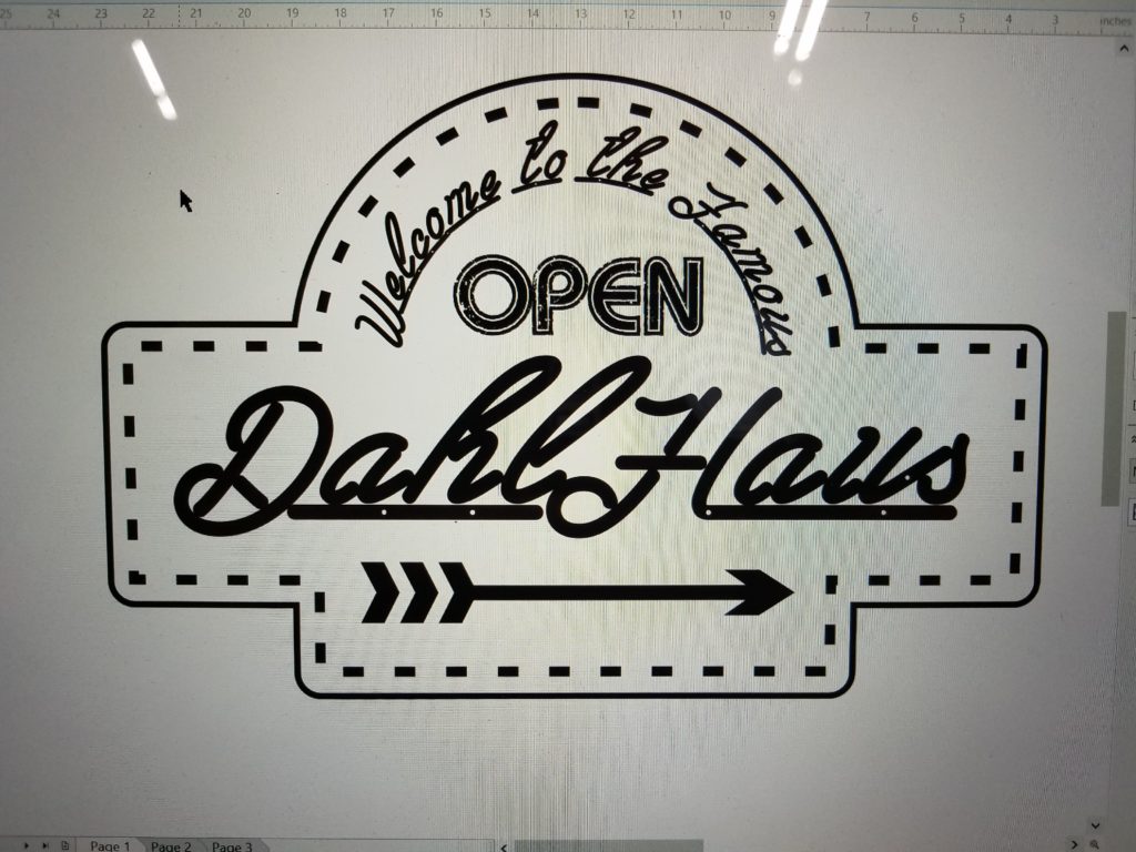 A photograph of the black and white Dahl Haus Sign design drawn in CorelDraw.
